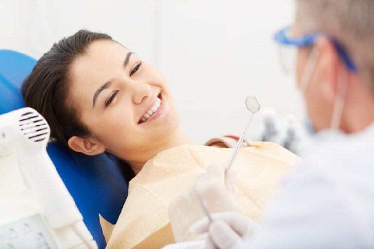 girl at dentist getting teeth whitening at vibes clinic in Dubai Jumeirah